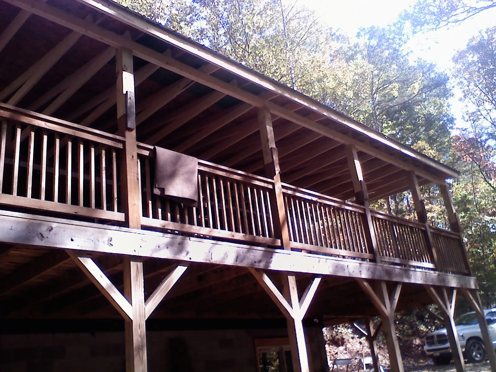 Timber framing under a new elevated porch and deck — Roof Leak Repair in Lake Mills by Roofing Brothers
